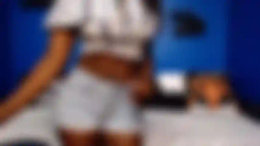 Strip Tease And Sucking Black Dildo