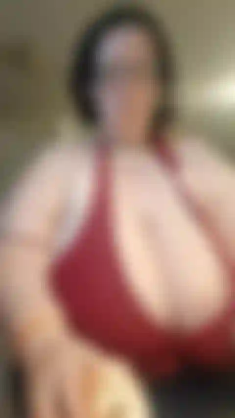 Cooking in red bikini top