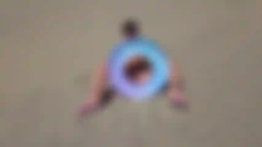 Pussy Grinding On Float At BeachAt the beach, I get incredibly horny so decide why not have a play! My pussy, peeking through the inflatable ring as I play, before I move on to humping and grinding on my inflatable.