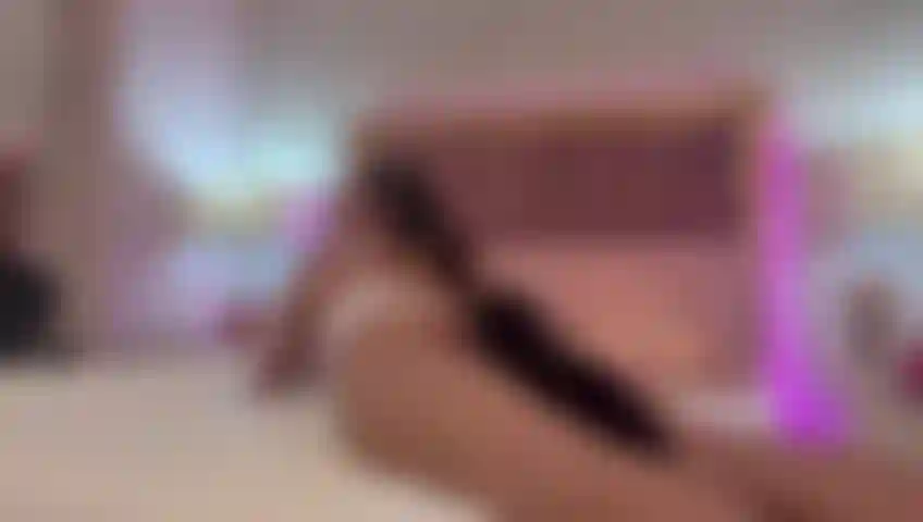 Playing with my two favorite toys, one in my ass and the other one fucking my pussy.