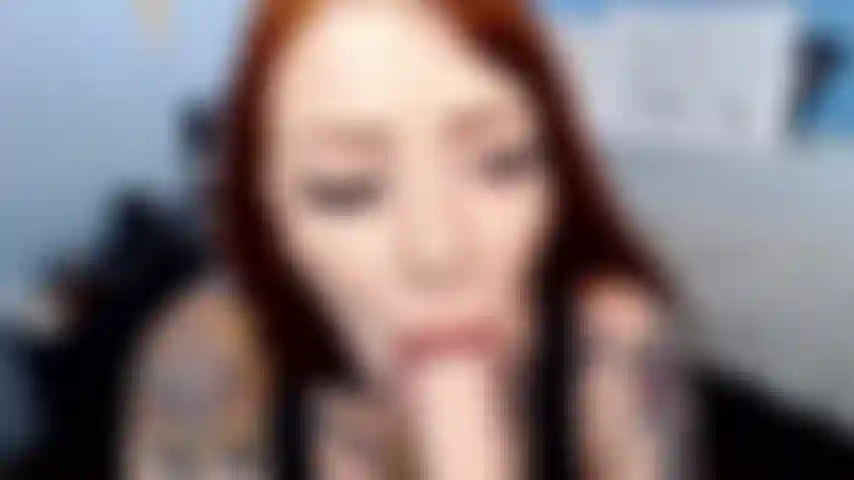 redheaded slut gives sloppy bj