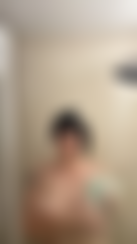 Washing my titties in the shower.