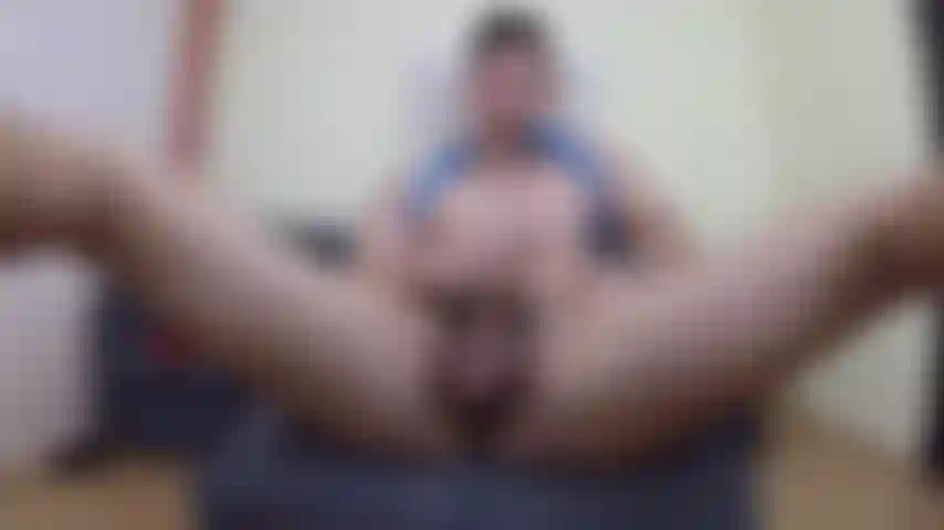 Masturbating with my legs open and blowing a load on my abs