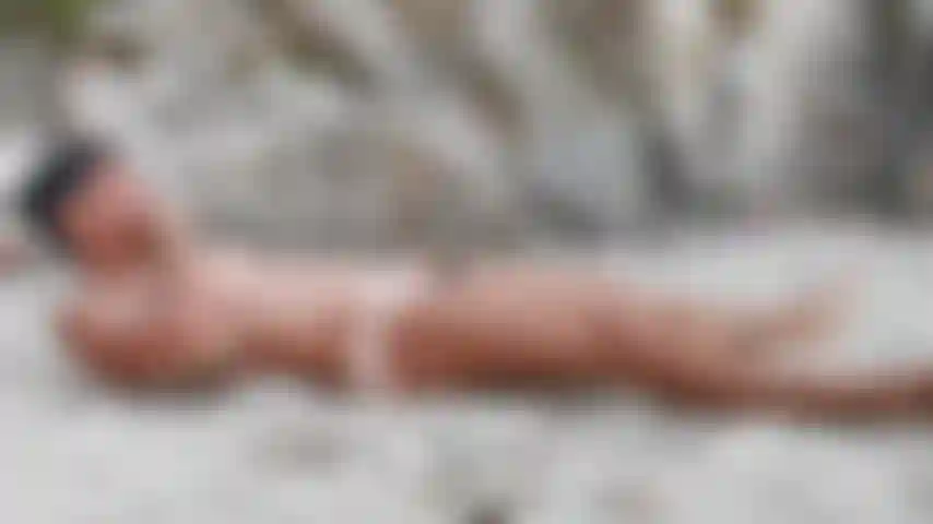 Smoking naked then taking a dip into the sea.