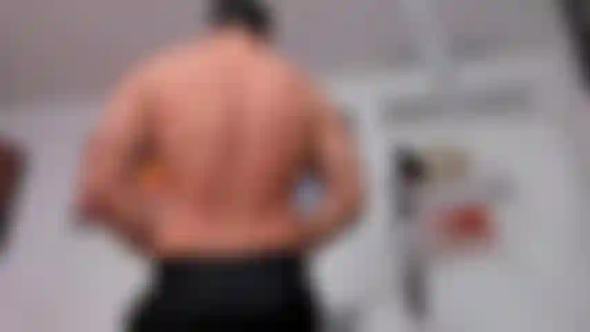 Flexing with business pants and demon face for Halloween.