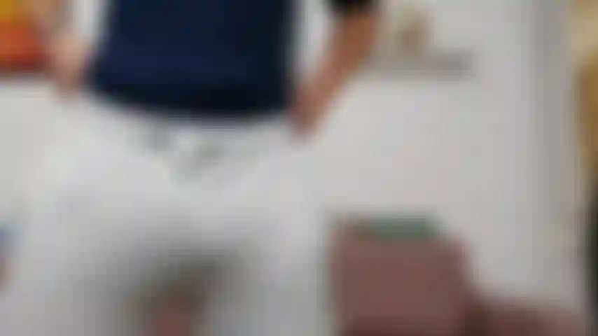 Close-up of my dick and balls with pants on, showing off my bulge