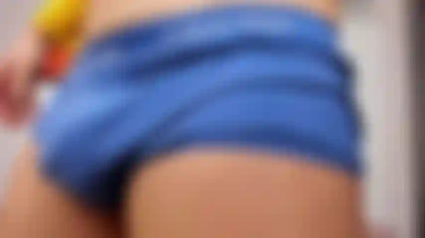 Masturbating on the couch with my yellow underarmour shirt on.