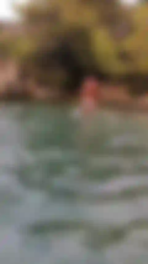 Walking on the beach showing off my ass