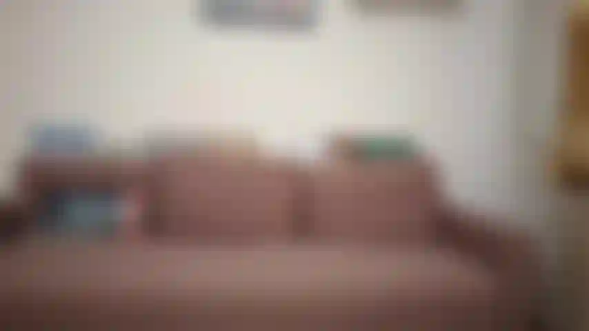 Headstand with white leggings on