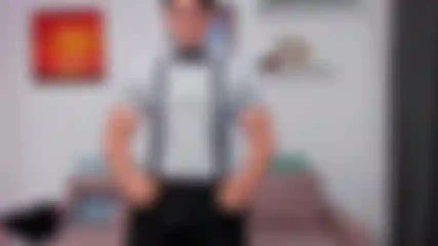 Dressed up in a tuxedo, with bowtie and suspenders, whilst dirty talking to you.