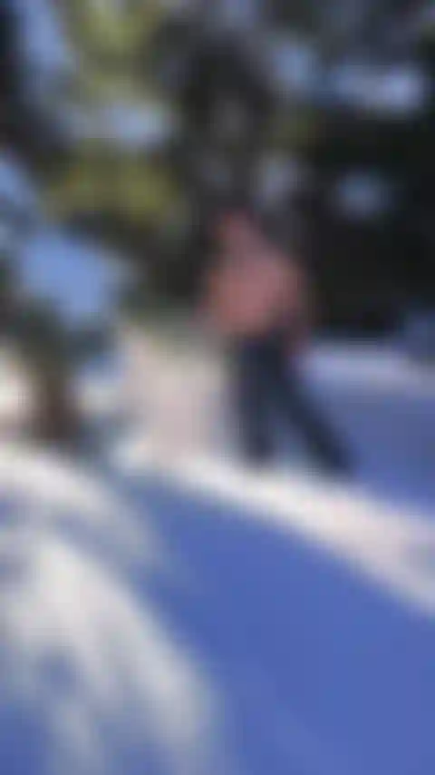Just fooling around topless in the snow