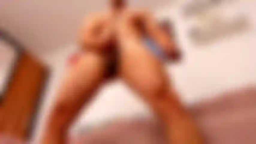 You are sitting on the floor and I am masturbating over you .