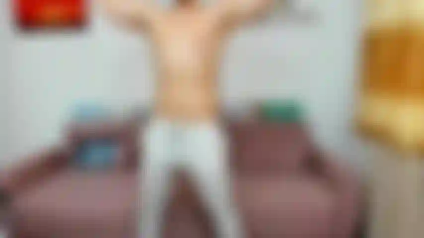 Flexing in sweatpants.