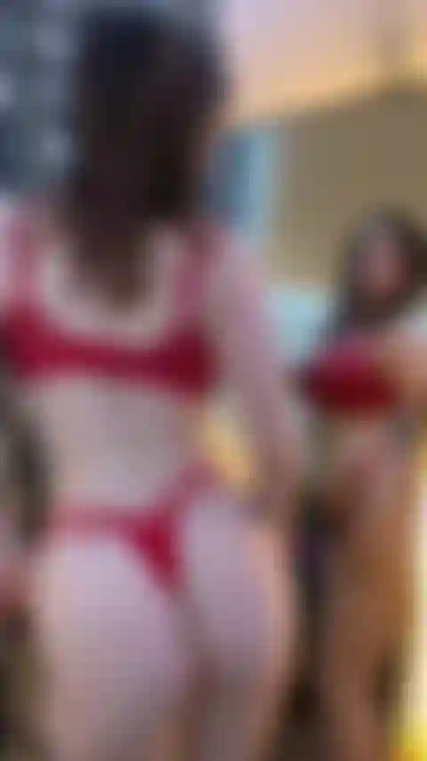 Dancing and stripping in front of mirror