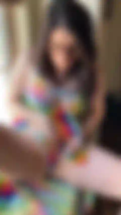 Cumming by the window