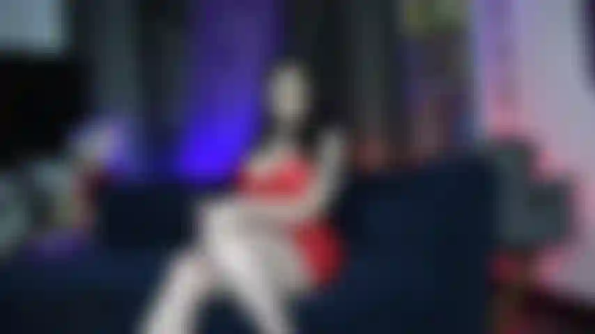 Wearing my rubbery shiny red dress, fence net stockings with red vinyl pointed toe pumps, no panties. Keeping my ass covered I spank myself put on a ball gag and make myself cum twice with my vibrator