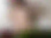 A sexy woman in the bathtub, waiting for company.