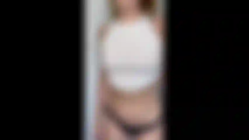 Changing tops to see my stiff nips