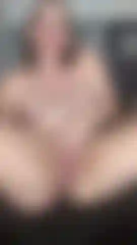 Spreading both holes laying back nude in a chair ..winking my dark arsehole and then playing with my clit until i orgasm