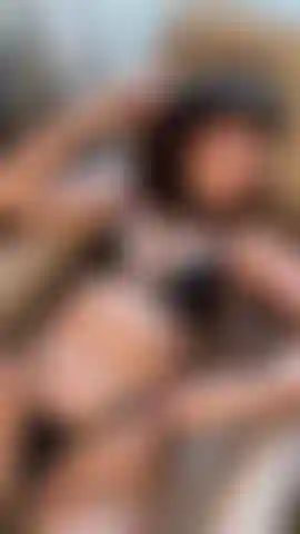 Me in my latex lingerie set and chain harness.