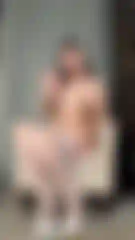 Spreading my legs in white stockings & heels.