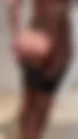 Trying to squeeze my ass into my latex tight skirt.