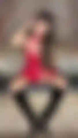 Teasing in my red wet look dress and pvc stiletto boots.