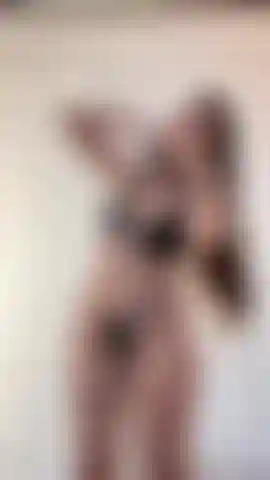 Trying on my latex outfit.