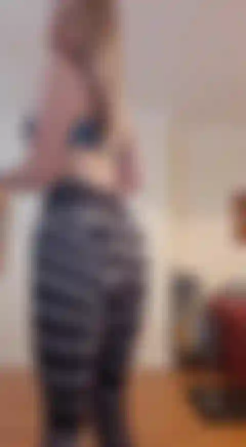 Squatting and flashing in gym-wear