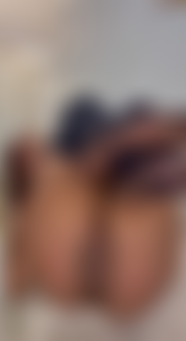 Sexy teen in stockings pokes her hosed feet in your face.