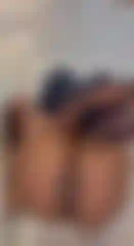 Sexy teen in stockings pokes her hosed feet in your face.