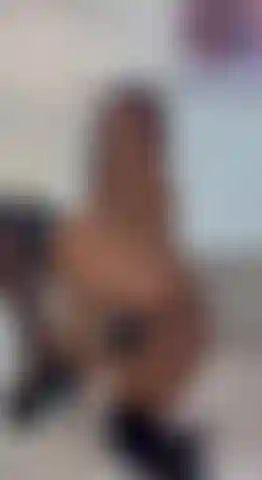 Playing with my pussy in sexy black heels.