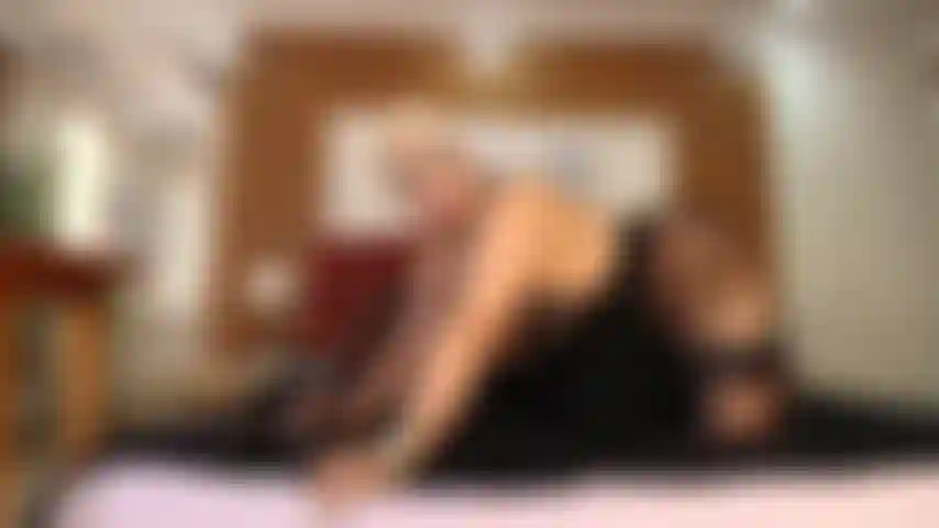 Sensual mature woman in her room.