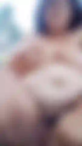 Squirting near the road with truckers passing by