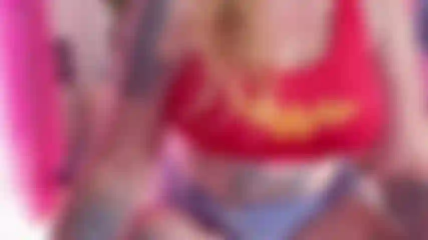 I'm perched on the edge of a chair, legs spread wide, so you get the perfect view. My fingers already slick as I trace slow, teasing circles around my swollen clit. I arch my back, letting my head fall back with a soft moan. My hips rock against my own touch, thighs trembling, pussy dripping onto the chair as I speed up—dildo plunging in deep, curling just right, gasping while I imagine it's your tongue. God, I'm so fucking wet for you...