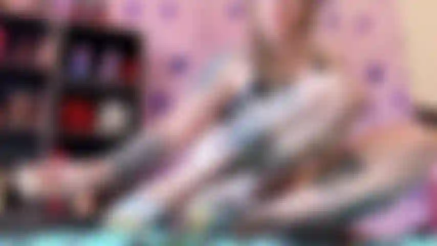 I'm on all fours in doggy pose, my round ass up high, gray high heels digging into the sheets. My thick, hairy pussy is dripping as I slam the big dildo deep inside me, thrusting back hard against it. Wet, sloppy sounds fill the room while my bush rubs against my hand with every rough stroke. Fuck, it feels so good stretching my hairy cunt.