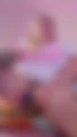 I'm perched on the edge of a chair, legs spread wide, so you get the perfect view. My fingers already slick as I trace slow, teasing circles around my swollen clit. I arch my back, letting my head fall back with a soft moan. My hips rock against my own touch, thighs trembling, pussy dripping onto the chair as I speed updildo plunging in deep, curling just right, gasping while I imagine it's your tongue. God, I'm so fucking wet for you...