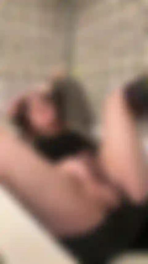 Nothing to see… just a hot woman stroking her big dick fully clothed in the bathtub.