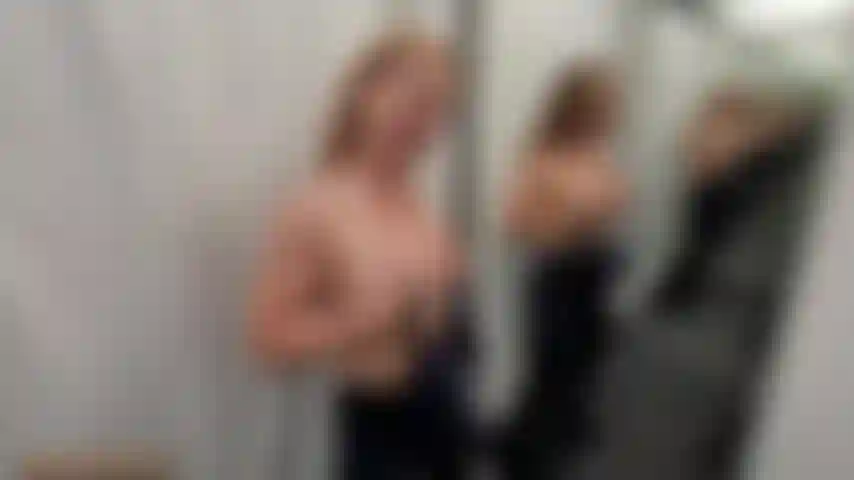 Trying on some Clothes in a Changing Room