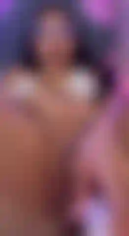 Whore masturbates with vibrator.