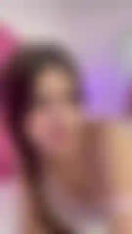 “Lying here, smiling just for you… do you like my soft feet? 💚 come closer