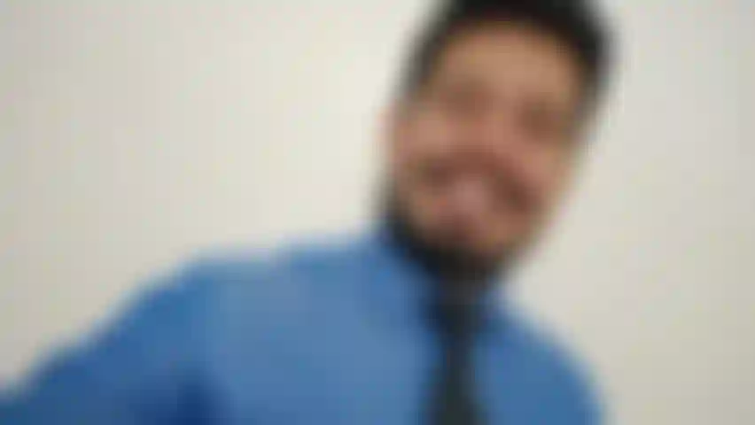 Blue shirt and brown  pants