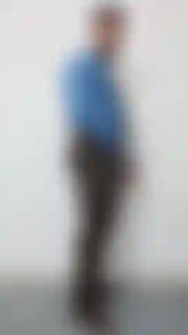 brow and blue suit