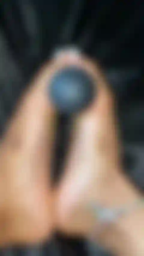 Pretty White Toes Plays With Toy