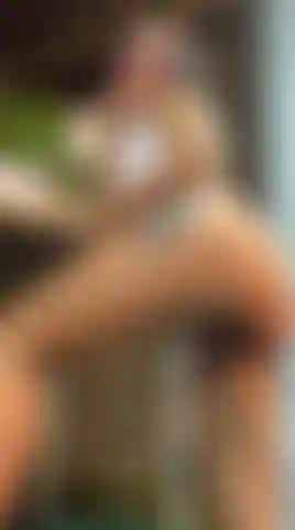 A naughty girl spanking her ass.