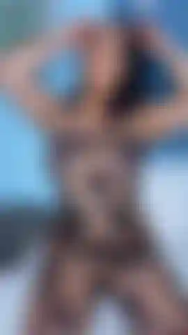 Crotchless mesh body suit.