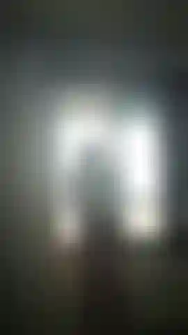 Brazilian blonde trans woman showing off her body in white lingerie.