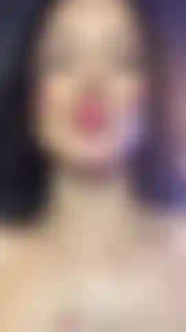 A smile and beautiful lips, and boobs.