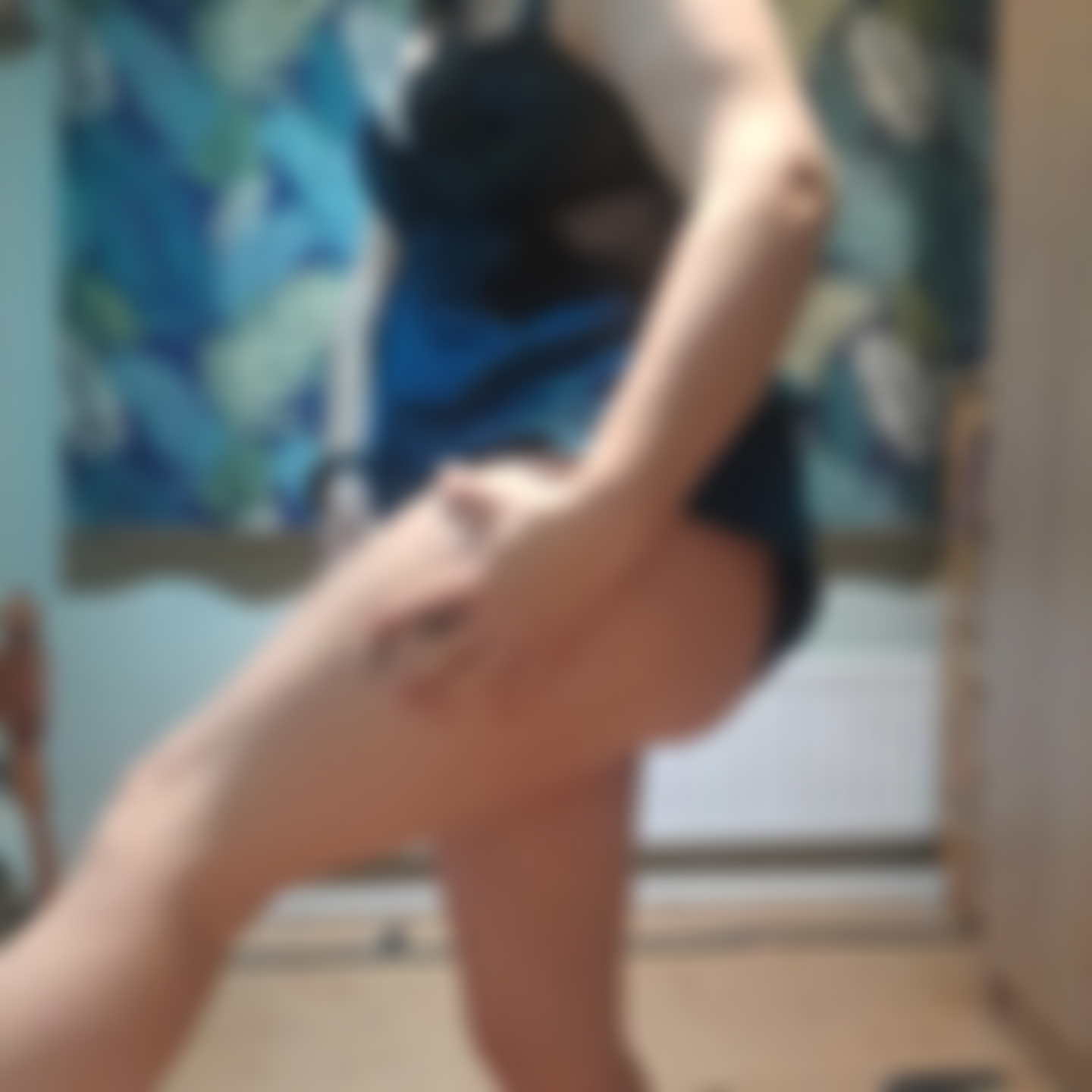 Showing a little leg tatt.