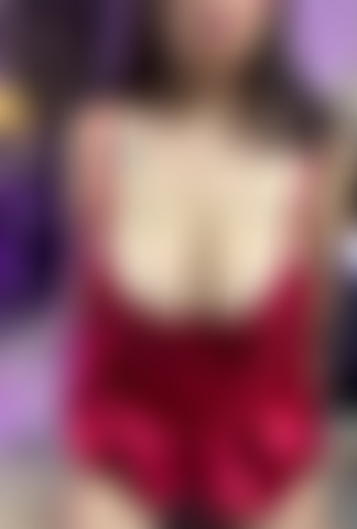 Flashing boobs on red dress.